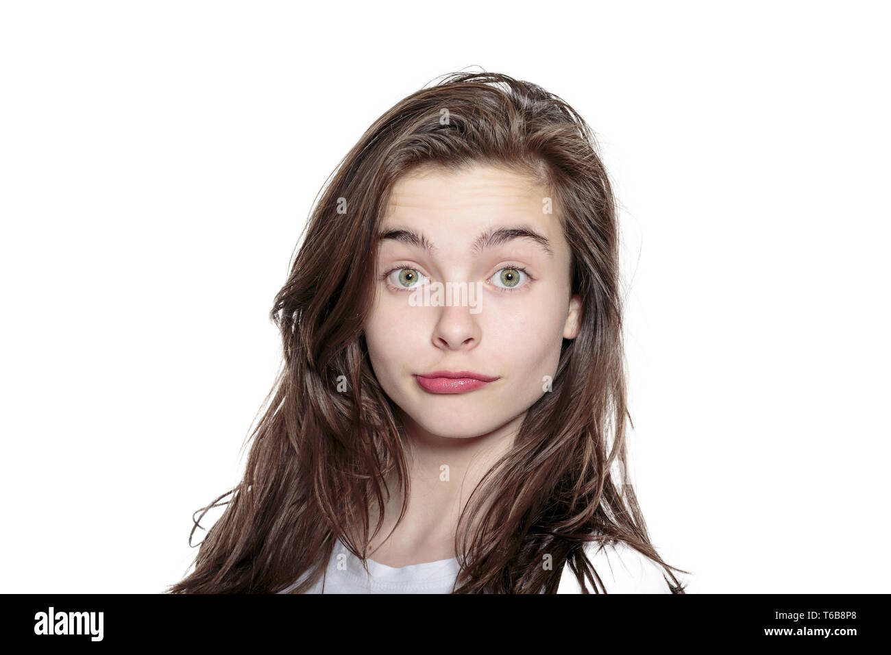 portrait of a teenage girl, looking puzzled Stock Photo