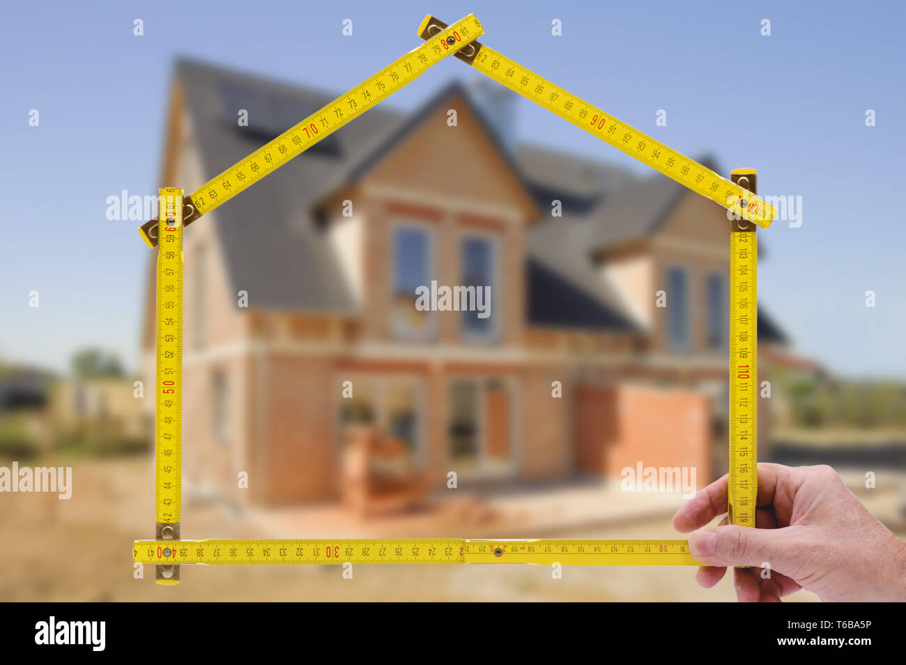 Construction folding ruler house shape hires stock photography and