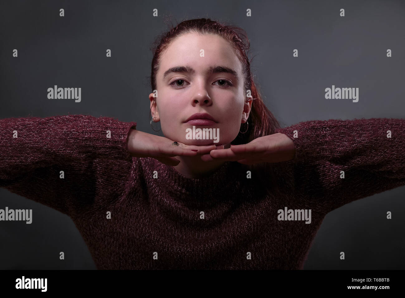 Chin on hands hi-res stock photography and images - Alamy