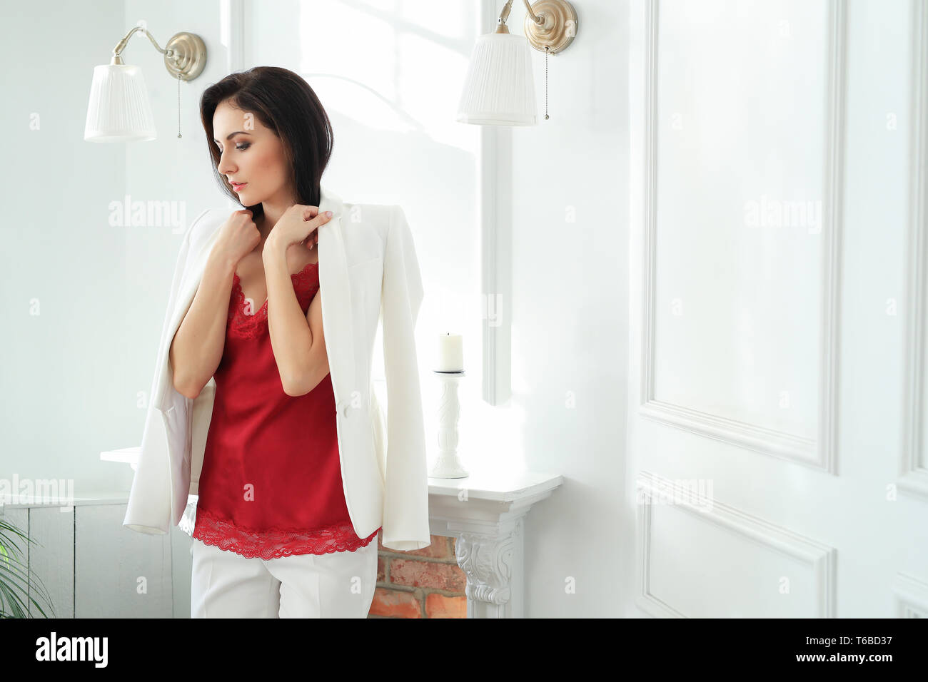 Female entrepreneur in red suit hi-res stock photography and images - Alamy