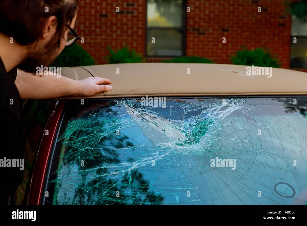 broken car glass shuttered cracked for accident in front of car front window Stock Photo Alamy