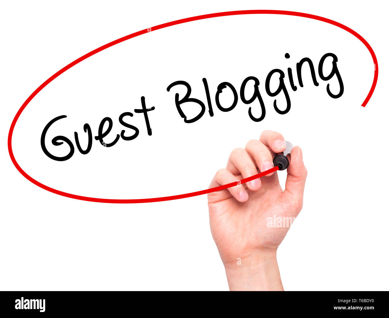 Man Hand writing Guest Blogging  with black marker on visual screen Stock Photo