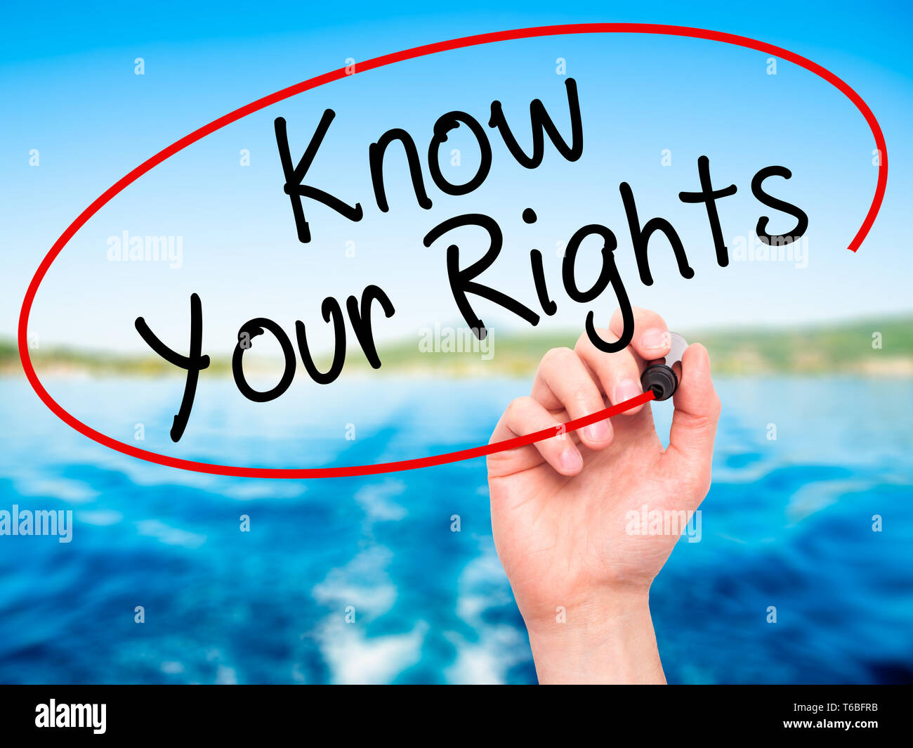 Man Hand writing Know Your Rights with black marker on visual screen ...