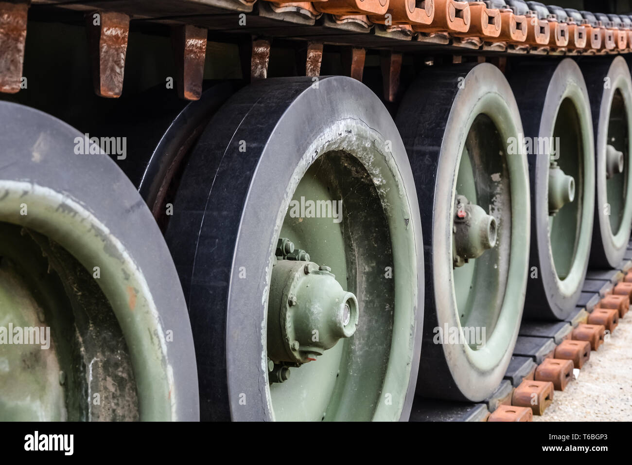 Close up of treads covering unmoving wheels Stock Photo