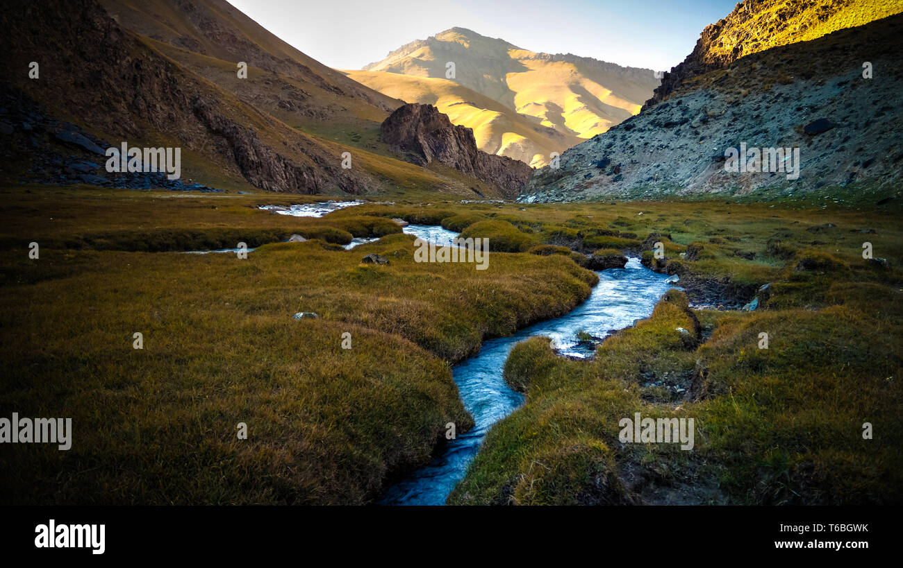 Sunset view to Tash-Rabat river and valley , Naryn province, Kyrgyzstan Stock Photo