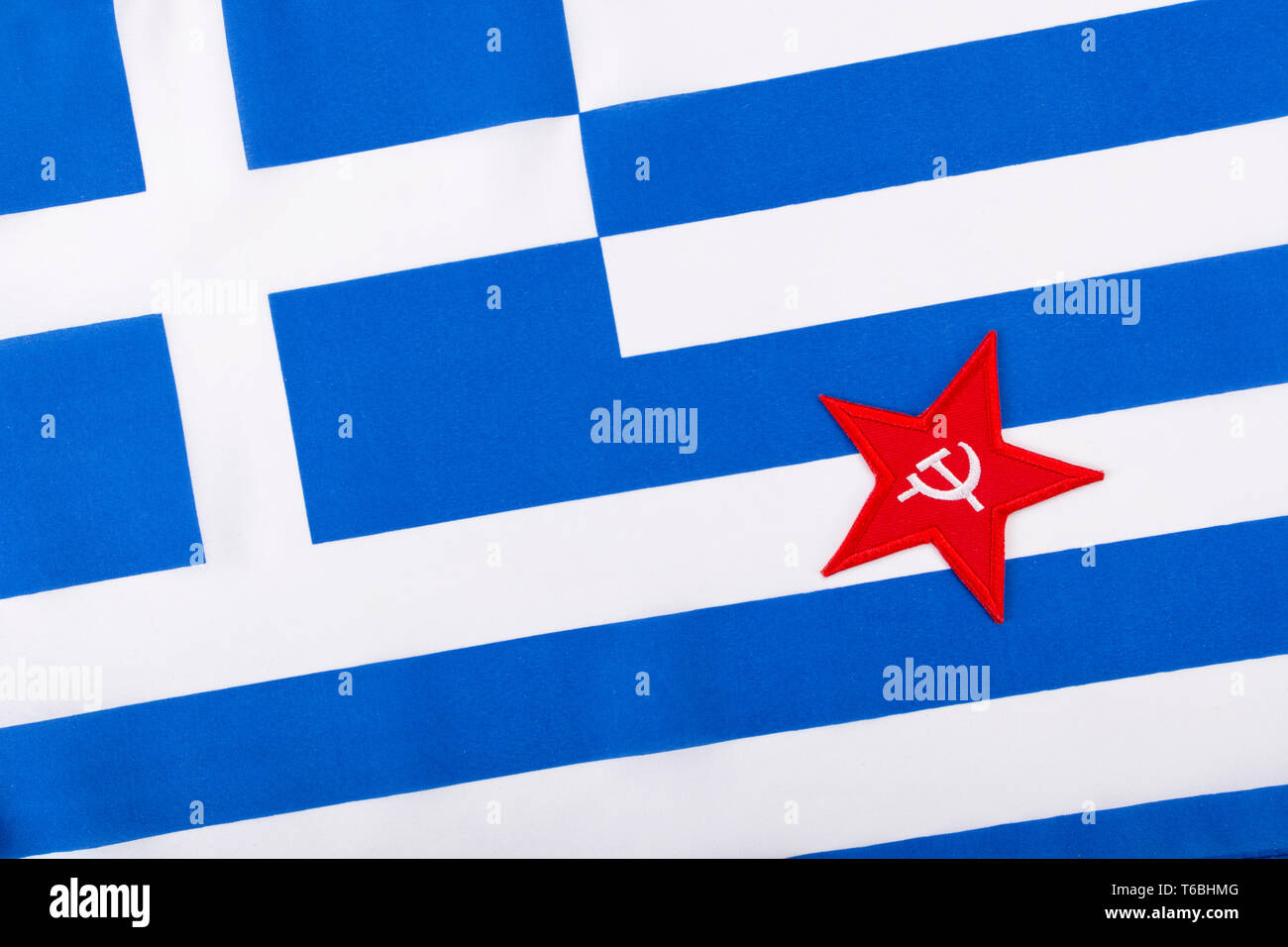 Red Star Hammer and Sickle badge with Greek flag. For Socialist election wins in Greek general election. Greek communists hammer & sickle, red star. Stock Photo