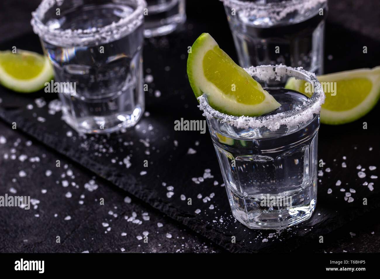 Tequila shot with lime and salt Stock Photo - Alamy