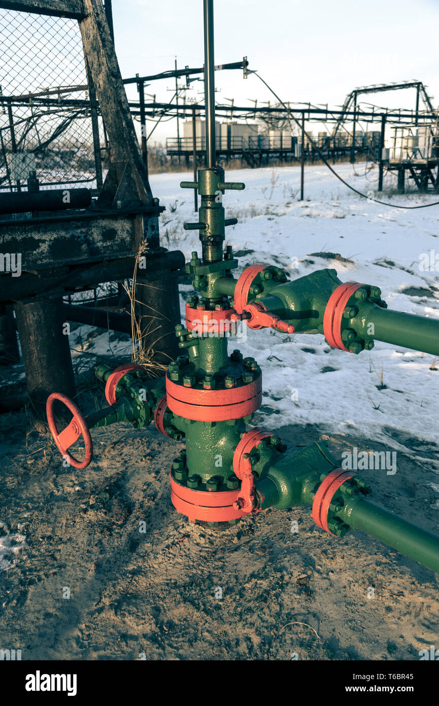 Group of wellhead. Oilfield with sand ground Stock Photo Alamy