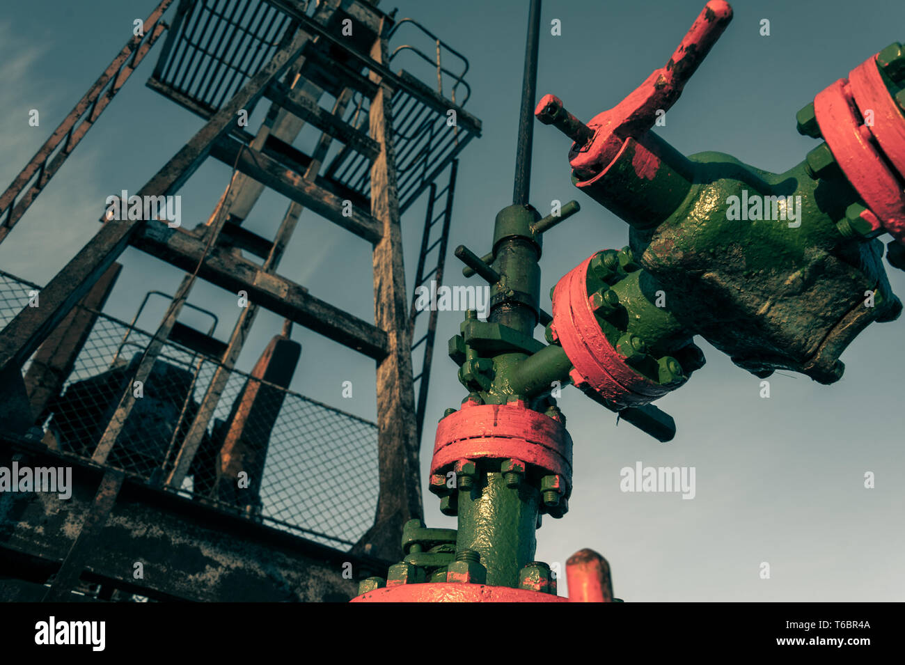 Group of wellhead. Oilfield with sand ground Stock Photo Alamy
