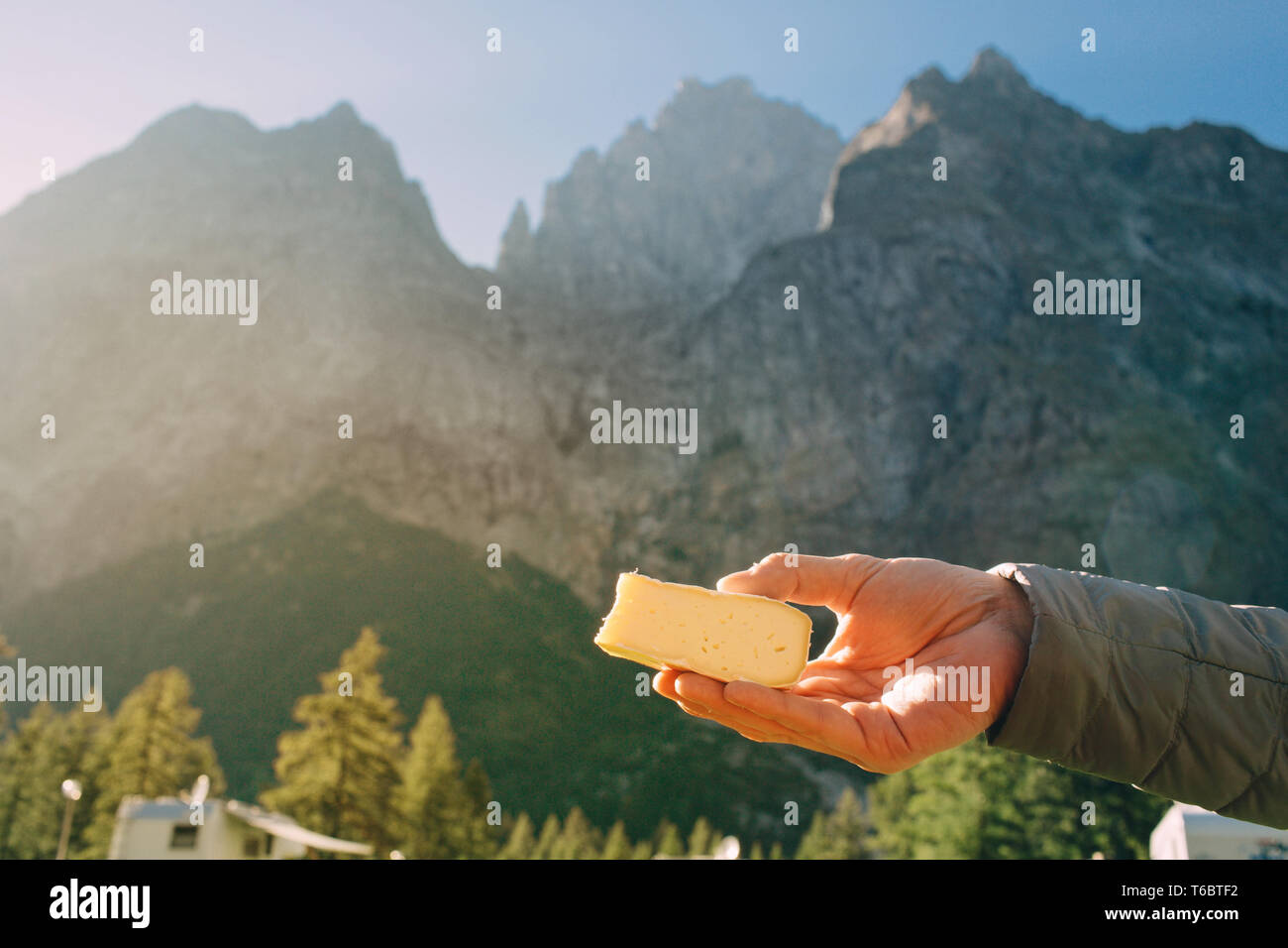 Creamy Brie over mountains, Alps background, France Stock Photo