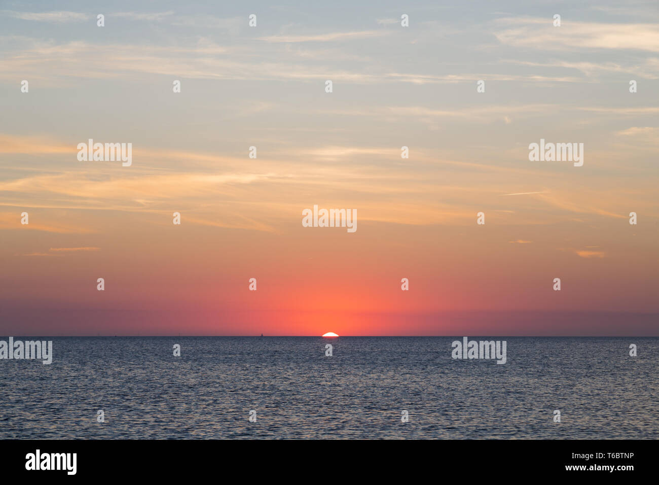 blurred sunset over the ocean for backgrounds Stock Photo