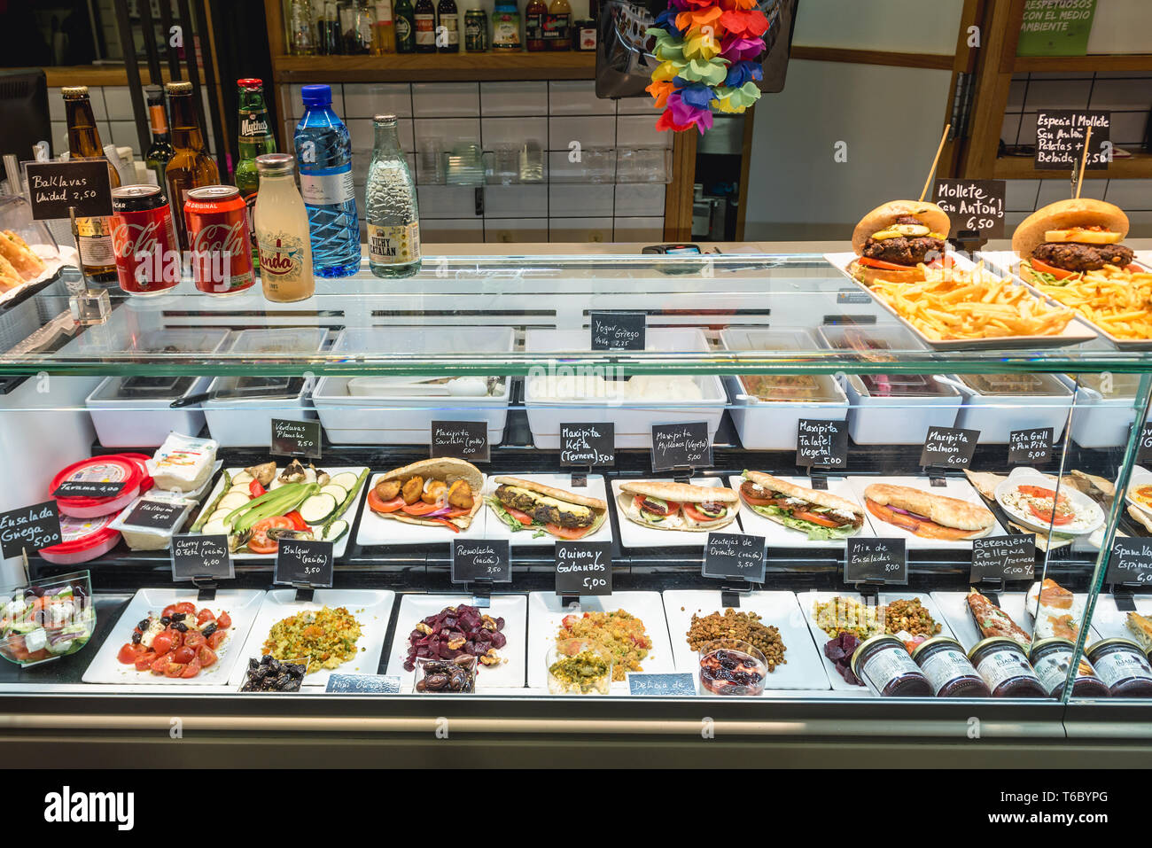 Food stall on Mercado de San Anton in neighborhood of Chueca, Madrid, Spain Stock Photo