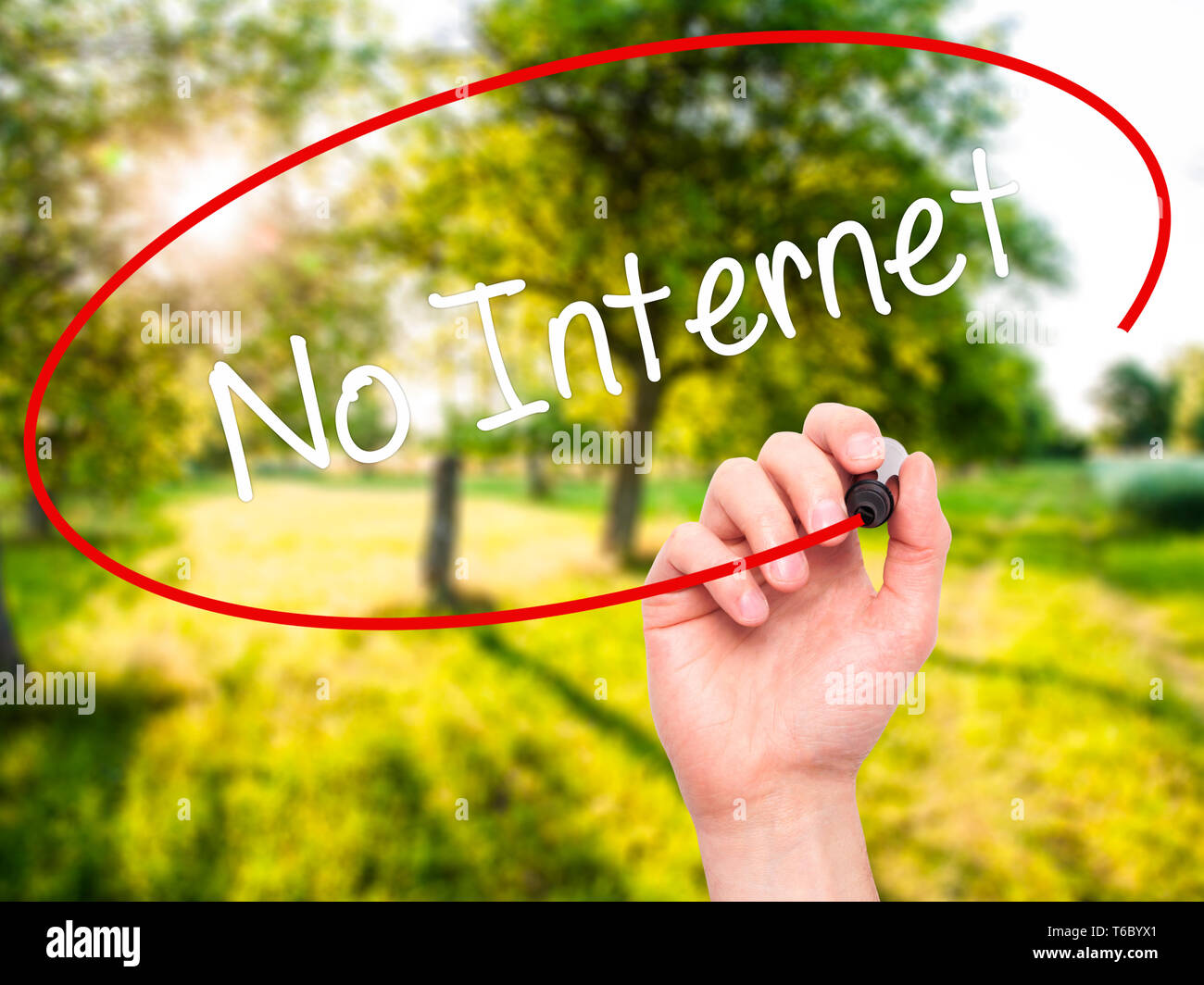 Man Hand writing No Internet with black marker on visual screen Stock Photo