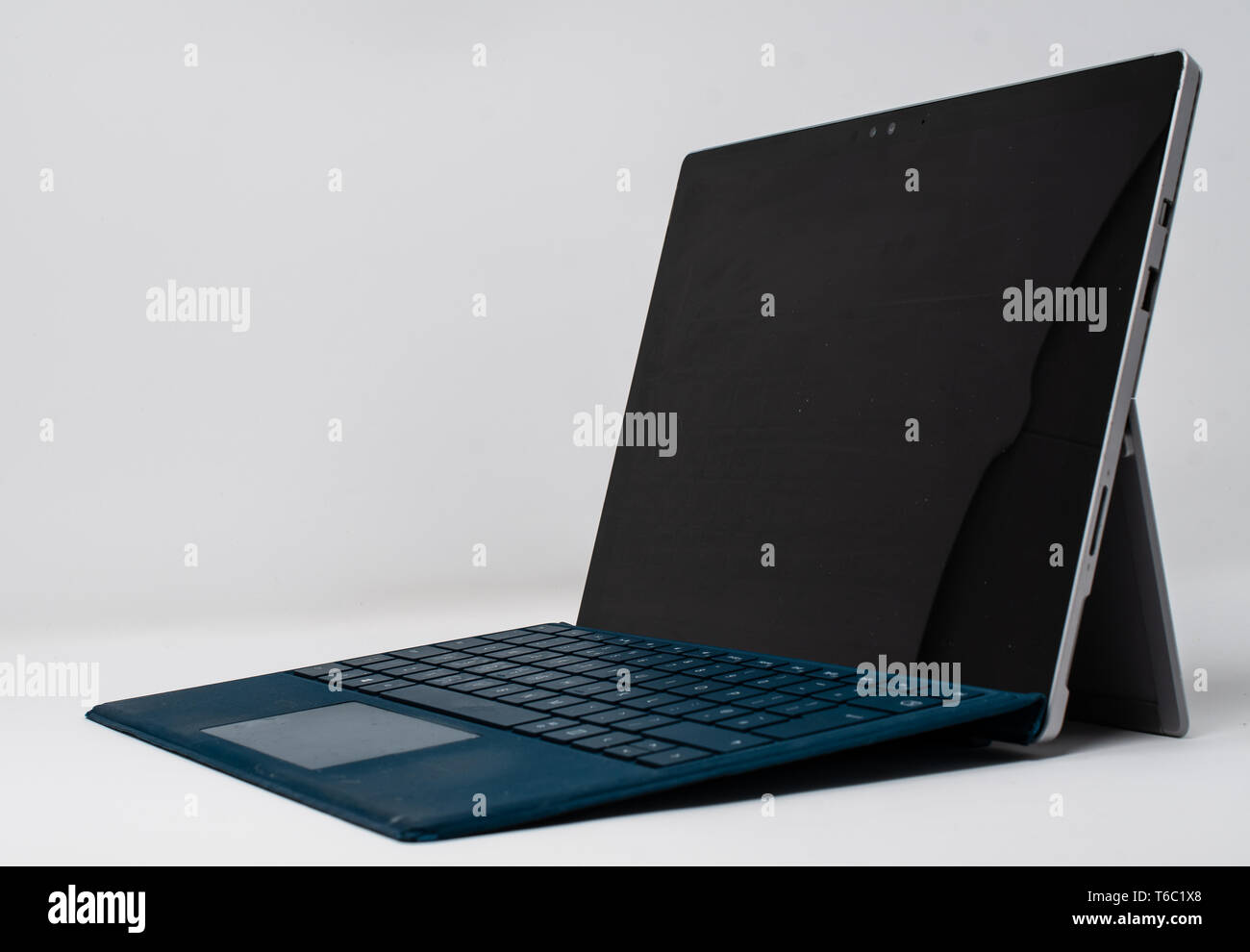 Reading, United Kingdom - April 19 2019:   A side on view of a Microsoft Surface Pro 4 tablet laptop hybrid Stock Photo