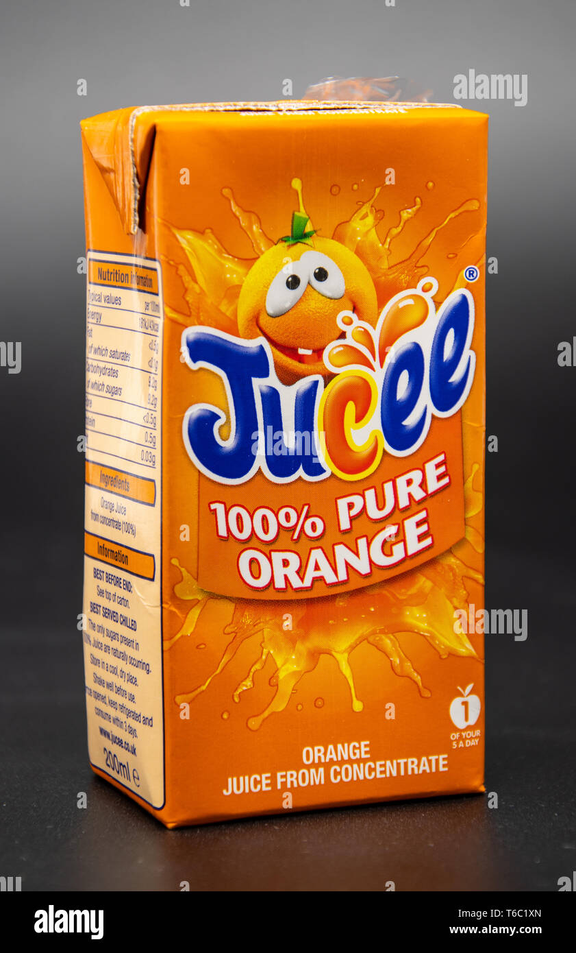Single Small Carton Of Tropicana Orange Juice With A Straw On White Stock Photo Alamy