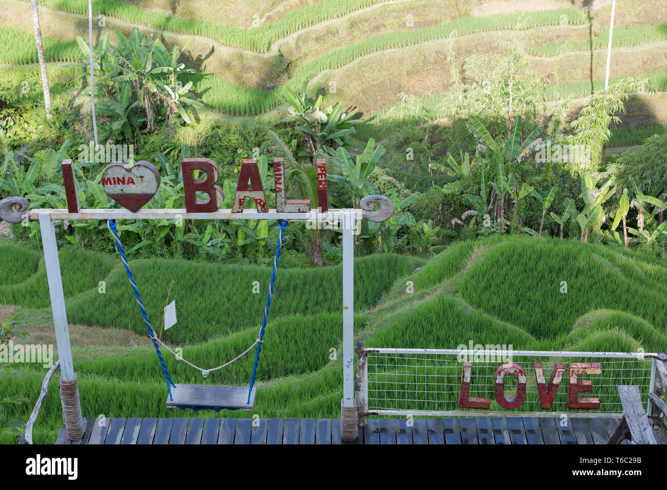 I love Bali sign with a swing over the paddy fields in Ubud Bali Indonesia Stock Photo