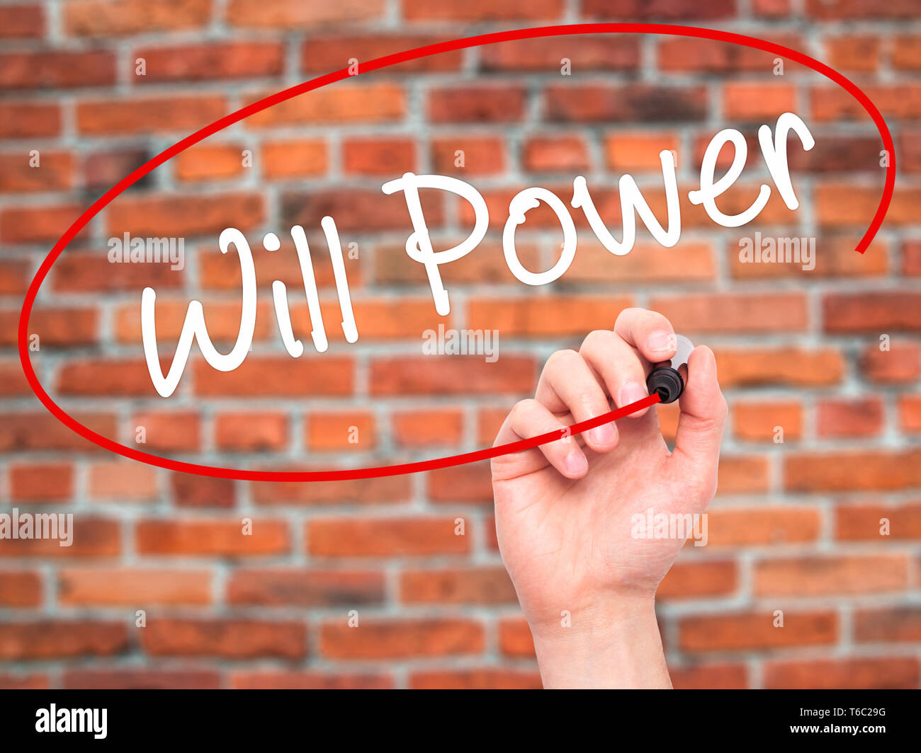 Man Hand writing Will Power with black marker on visual screen Stock Photo