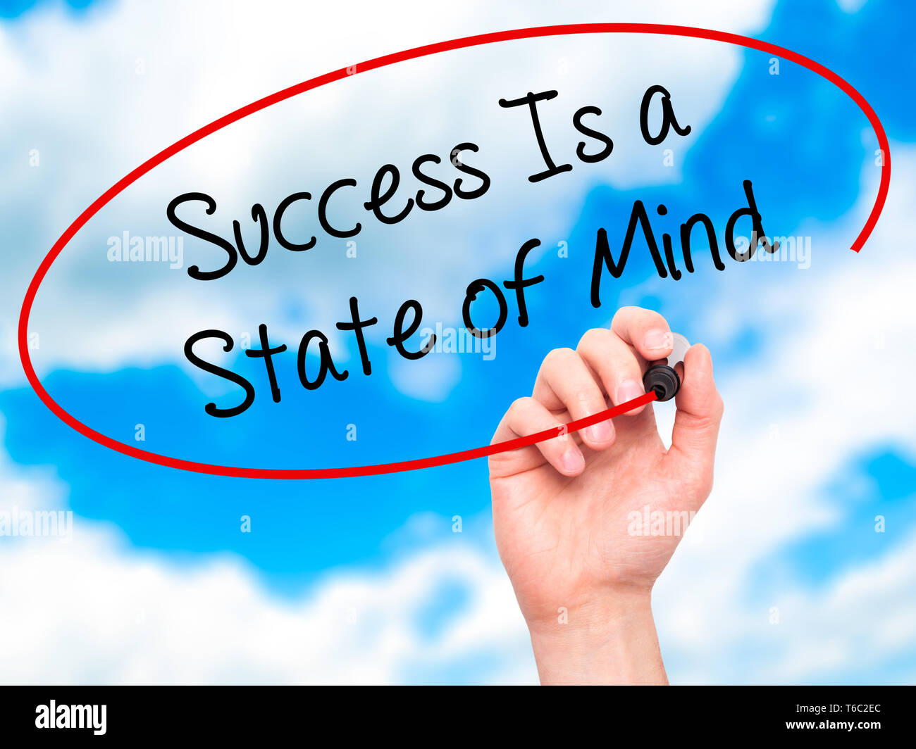 Man Hand writing Success Is a State of Mind with black marker on visual screen Stock Photo