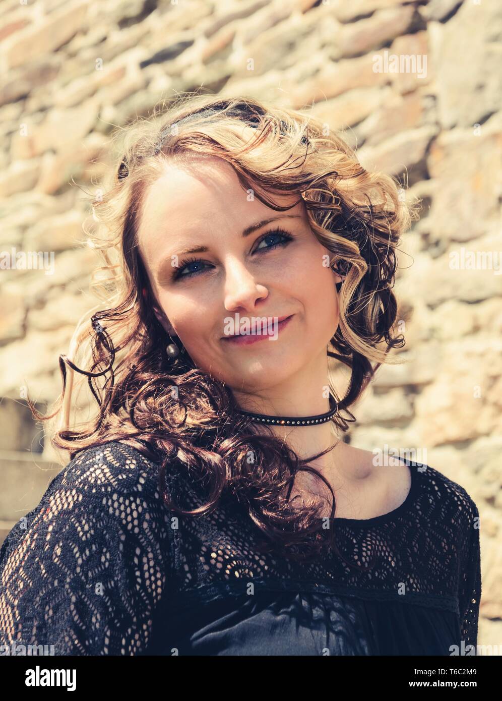 Blond curly hair woman hi-res stock photography and images - Alamy