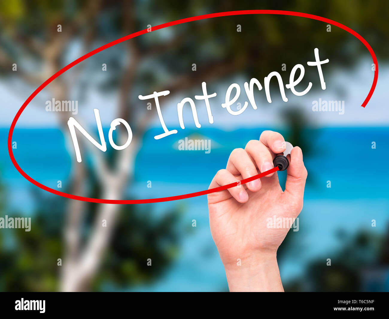 Man Hand writing No Internet with black marker on visual screen Stock Photo