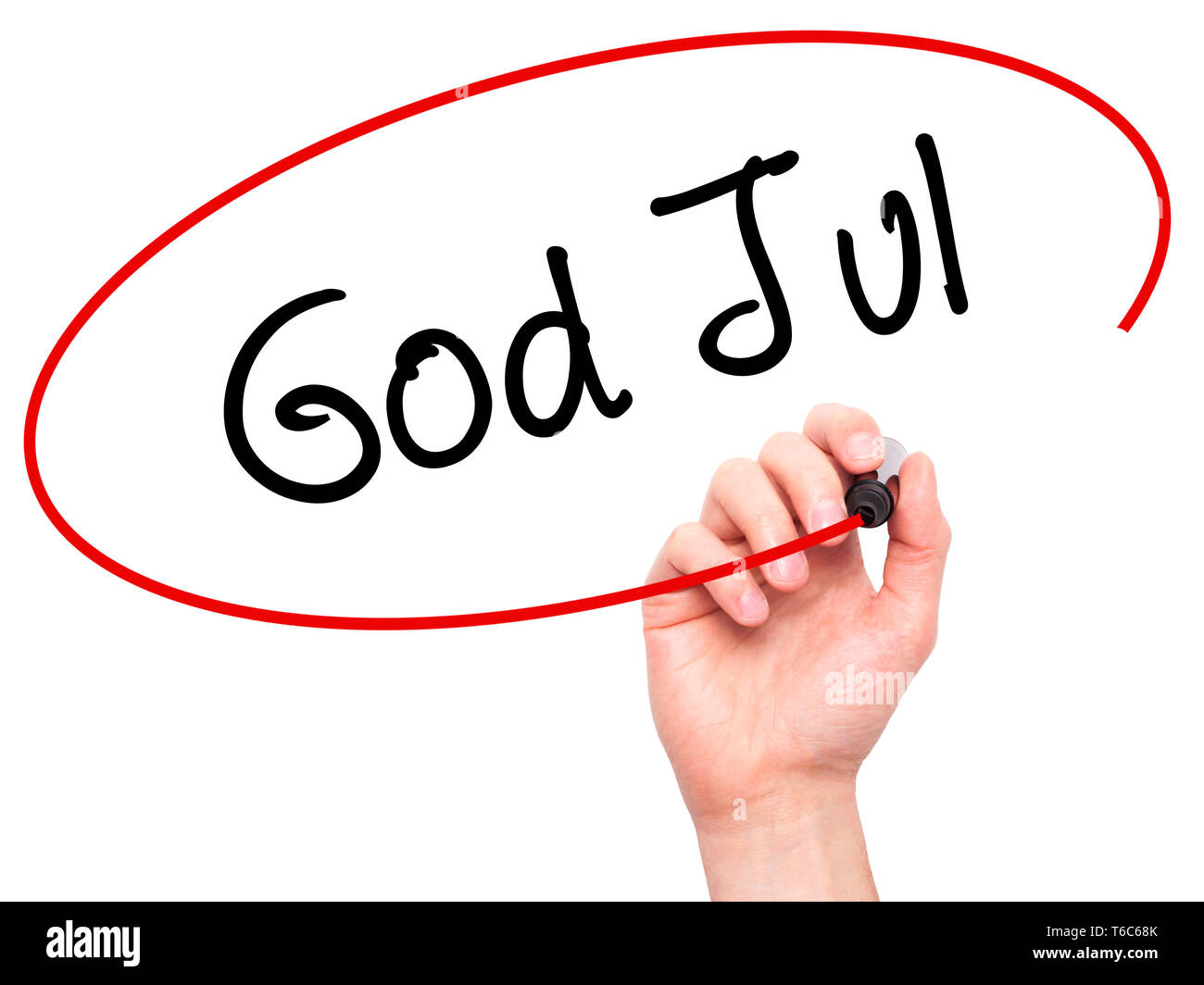 Man Hand writing God Jul  (Merry Christmas in Swedish) with black marker on visual screen Stock Photo