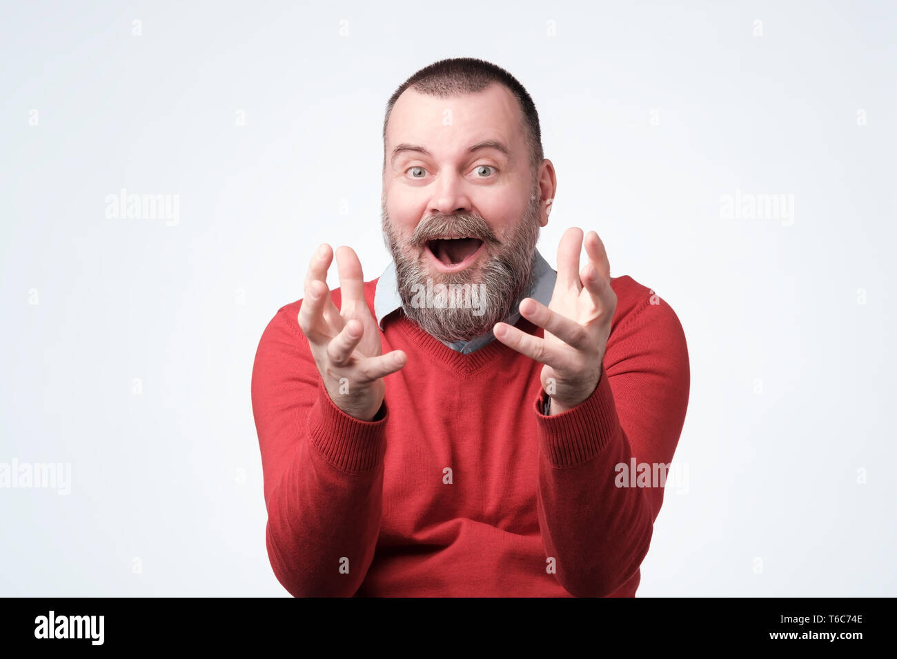 Mature bearded guy achieves big effective results Stock Photo