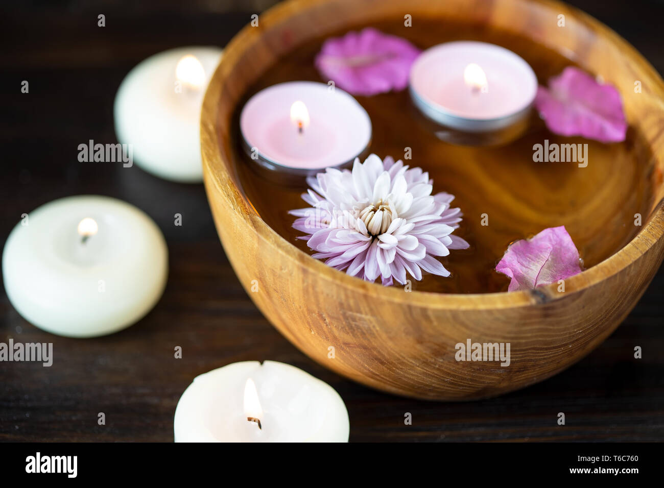 Aromatherapy cosmetics candle body massage oil rose hires stock