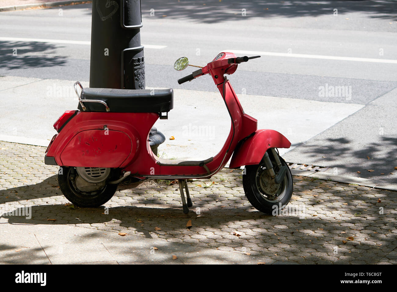 Scooter on the roadside at the Kurfuerstendamm in Berlin Stock Photo