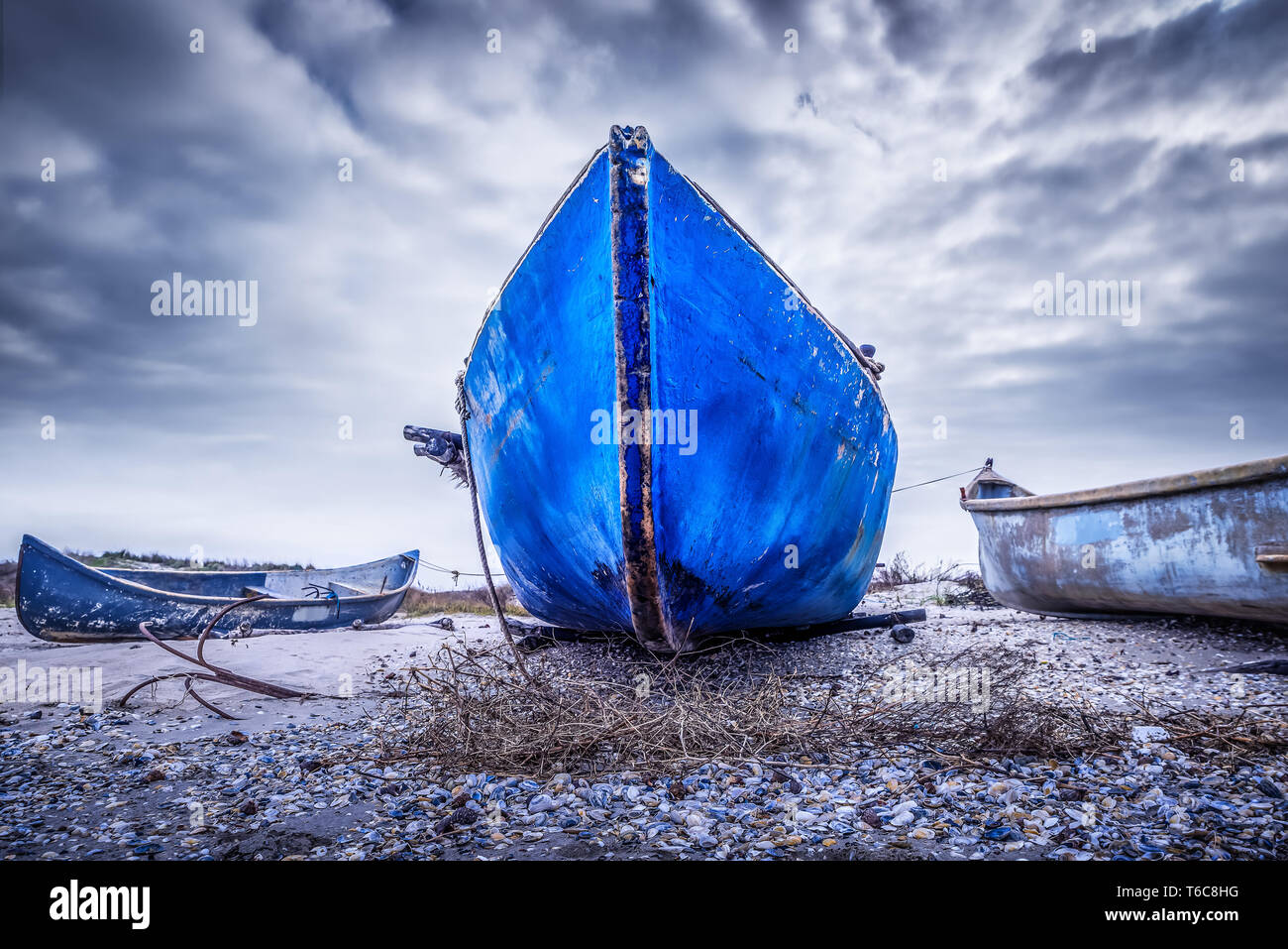 Empty blue fishing boat hi-res stock photography and images - Alamy