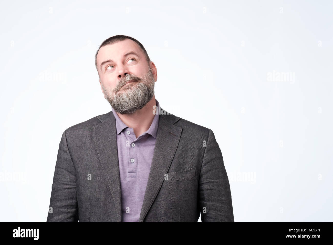Mature caucasian man thinking about his life problem. Stock Photo