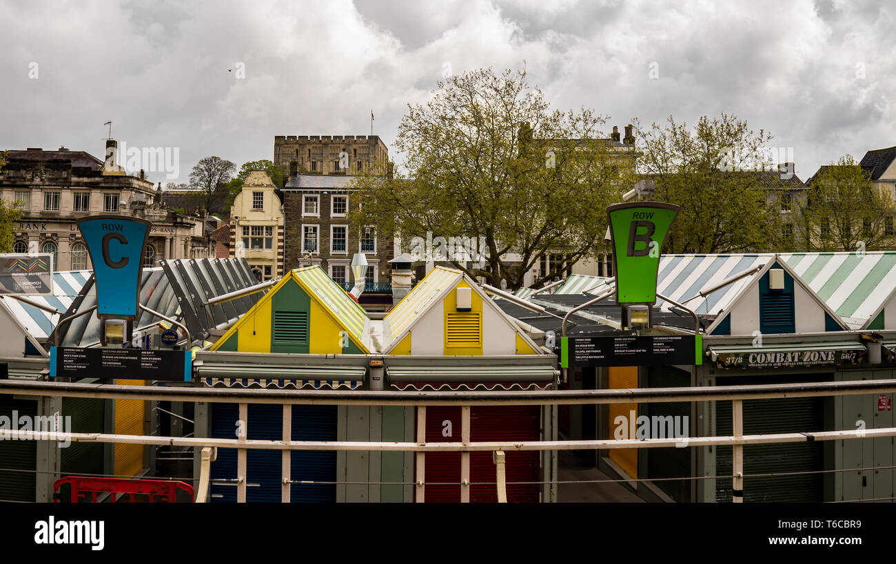 Looking over Norwich outdoor market towards the shops in the distance