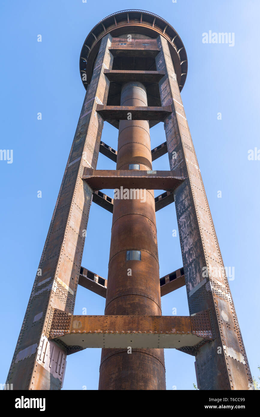 old rusty water tower and clear blue sky Stock Photo - Alamy