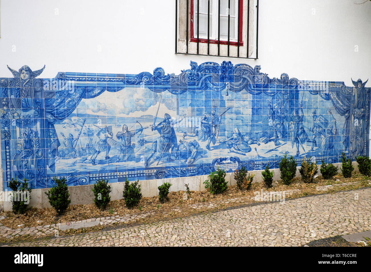 Historical depiction of the Seige of Lisbon 1147 knights attacking commemorated in blue wall tiles azulejos in Alfama Lisboa Portugal  KATHY DEWITT Stock Photo
