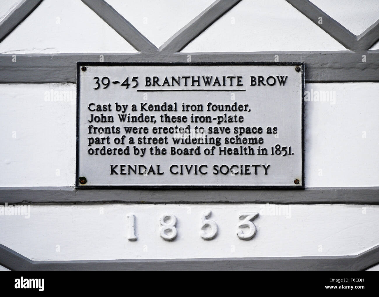 Descriptive plaque. Cast-iron frontage on Nos.39-45 Branthwaite Brow, Kendal, Cumbria, England, United Kingdom, Europe. Stock Photo