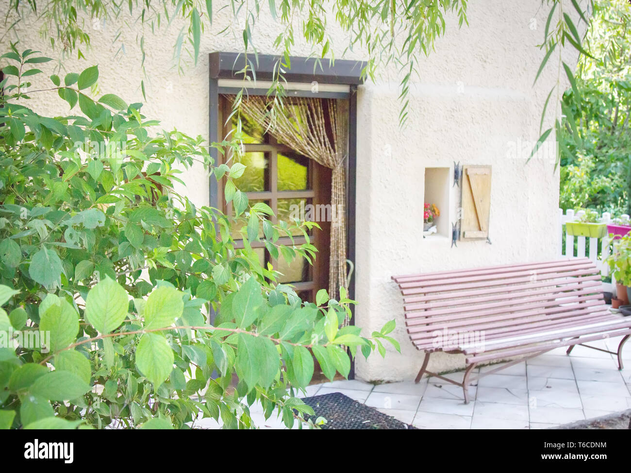 cozy courtyard with benches Stock Photo - Alamy