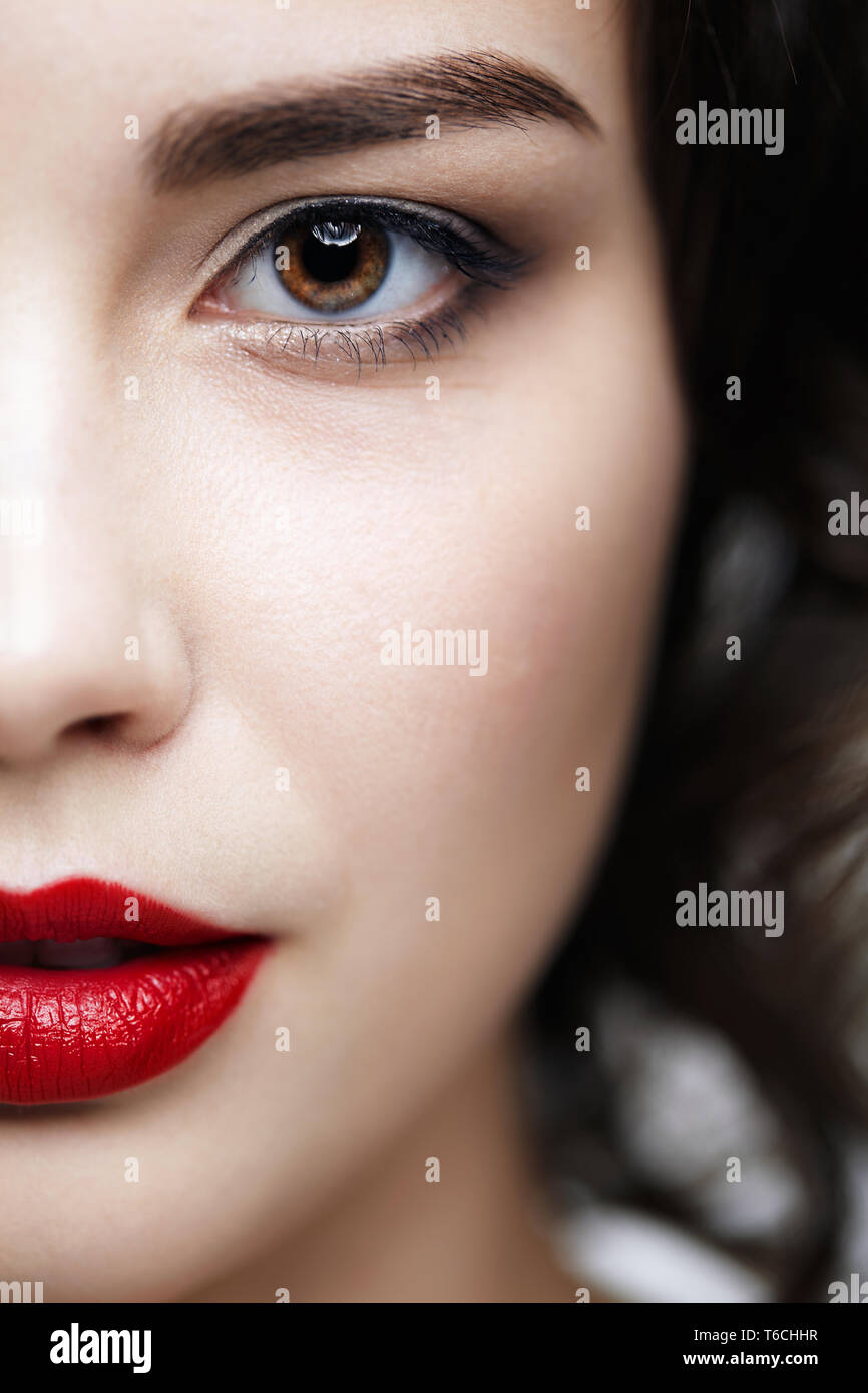 Closeup macro portrait of female face. Human woman half-face with day ...
