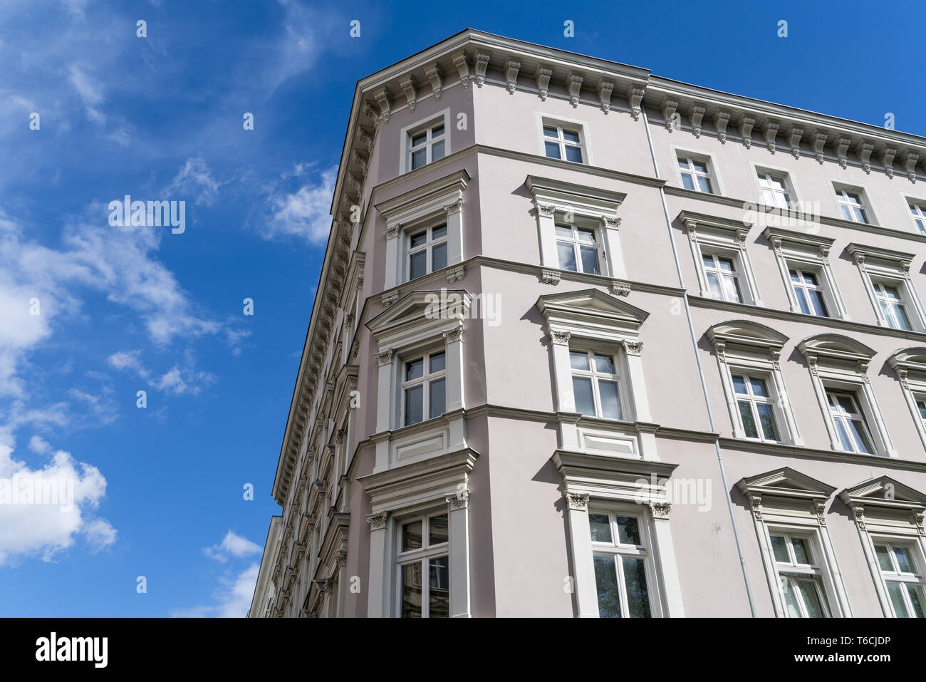 beautiful old corner house with blue sky Stock Photo - Alamy