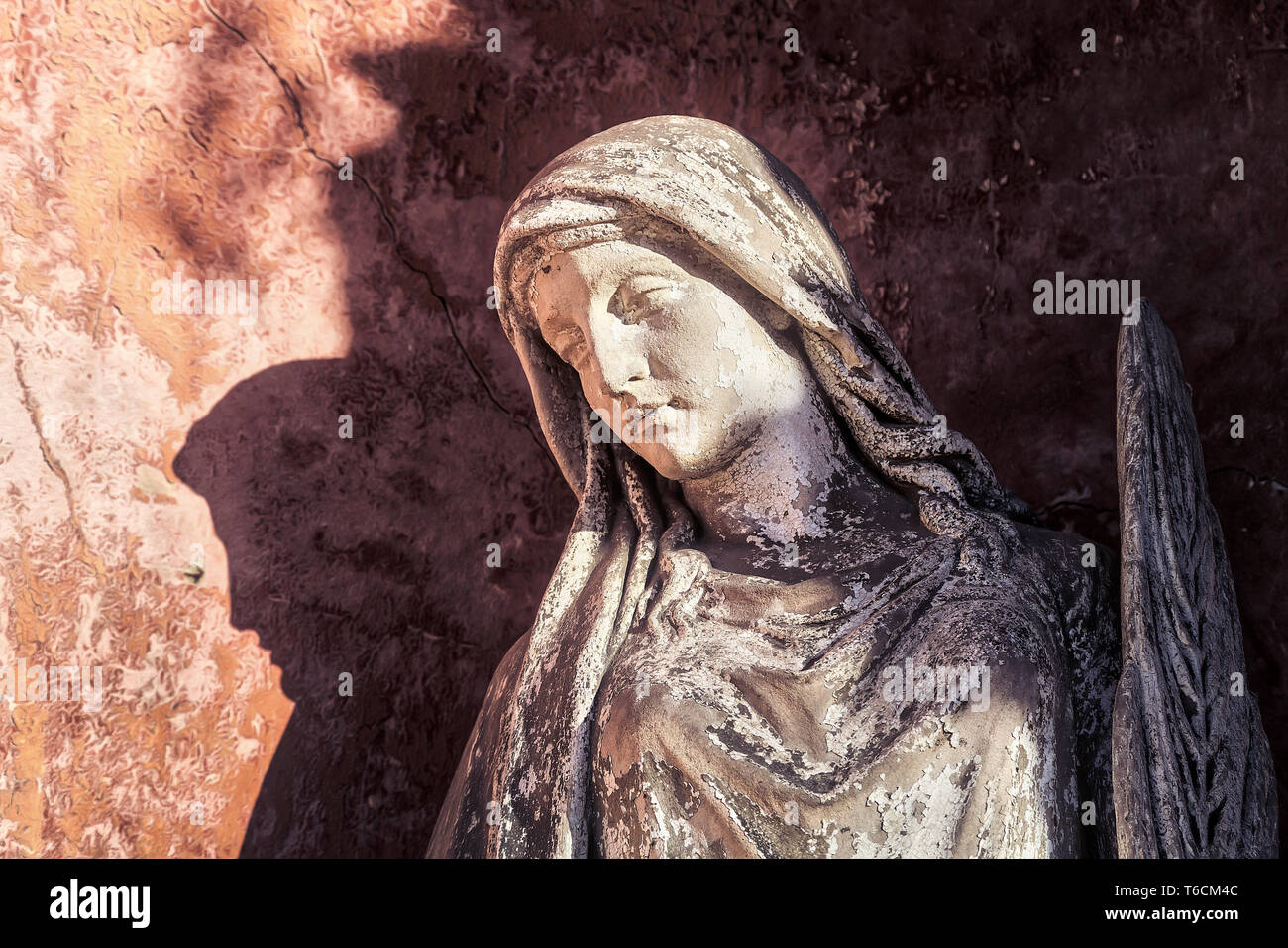 old sculpture of a woman with peeling paint Stock Photo - Alamy