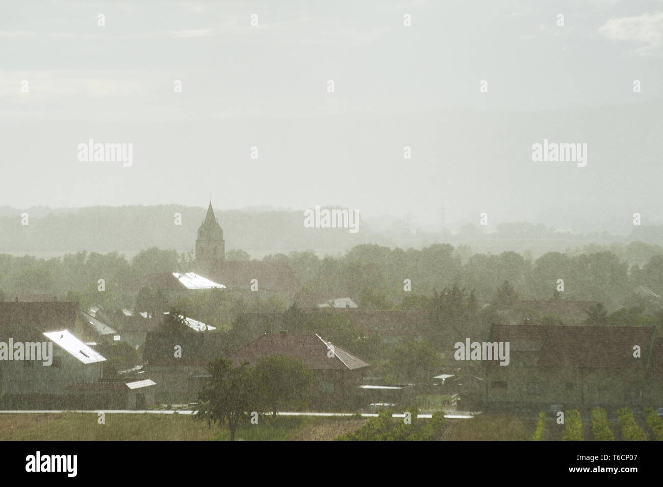 Rain and sunshine in the village Oslip in Burgenland Stock Photo