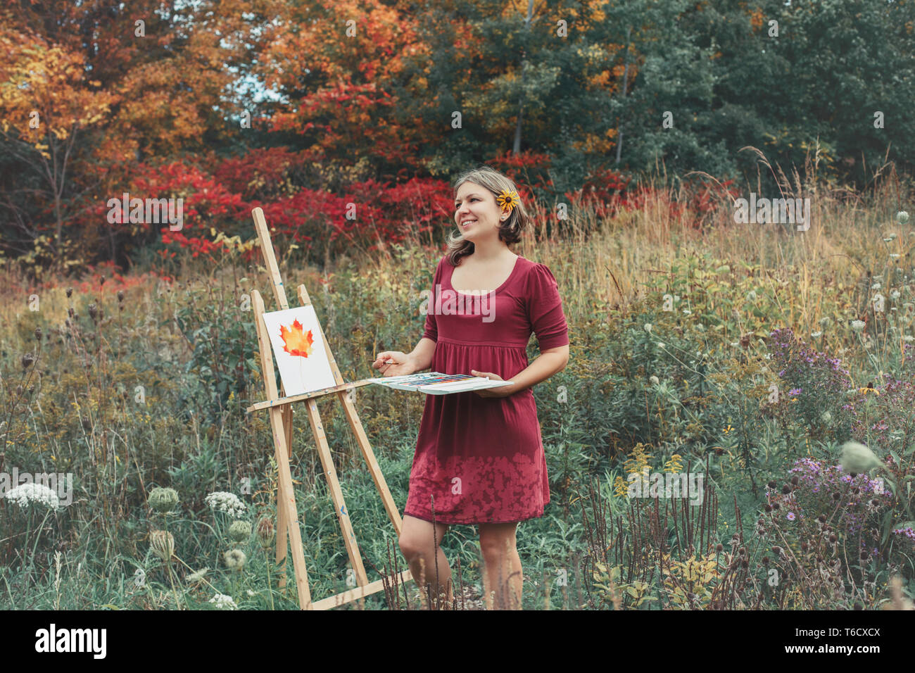 Woman painting easel outside hi-res stock photography and images - Alamy