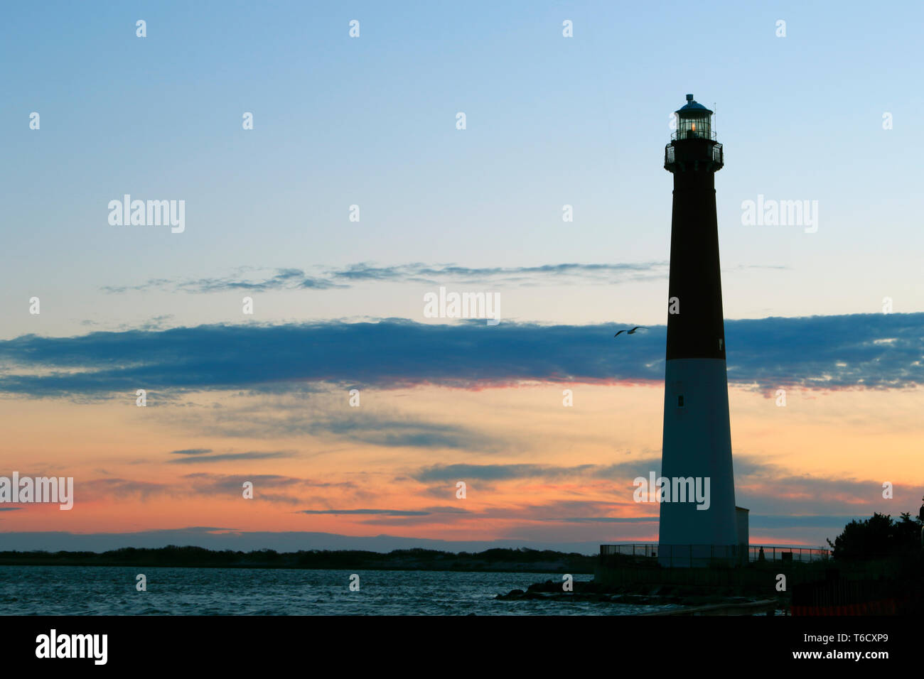 Barnegat Lighthouse at sunrise, Long Beach Island, New Jersey, USA Stock Photo