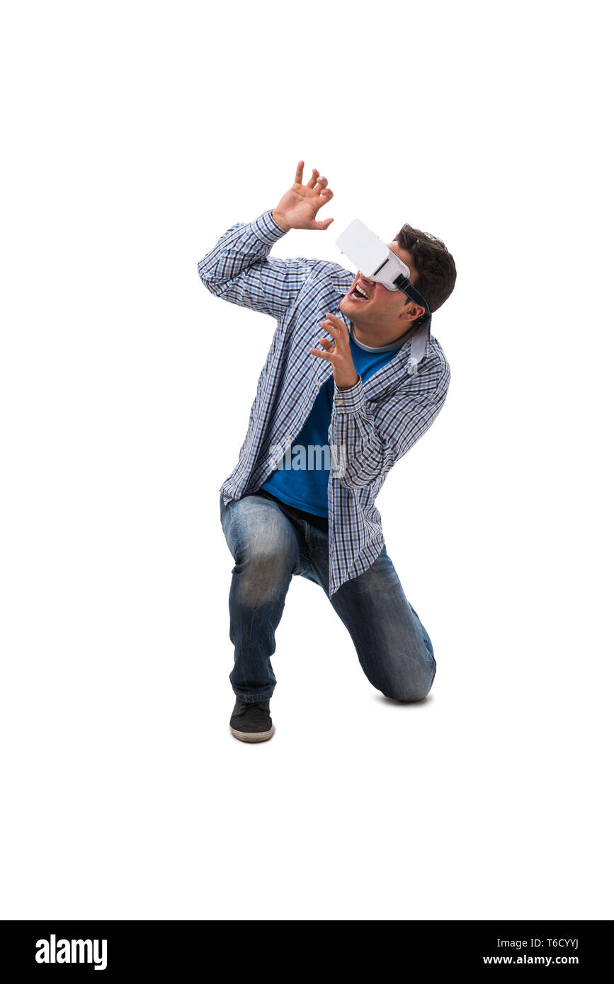 Young man wearing virtual reality VR glasses Stock Photo