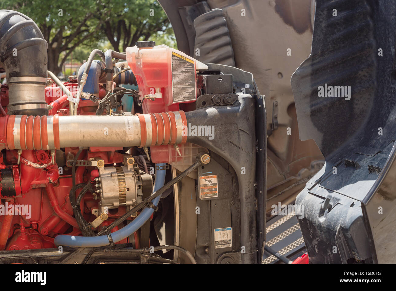Fullyelectric class 6 delivery truck open hood with engine inside
