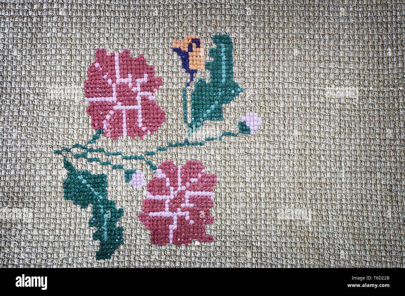 Craft: embroidered cross-stitch flowers beautiful Stock Photo - Alamy