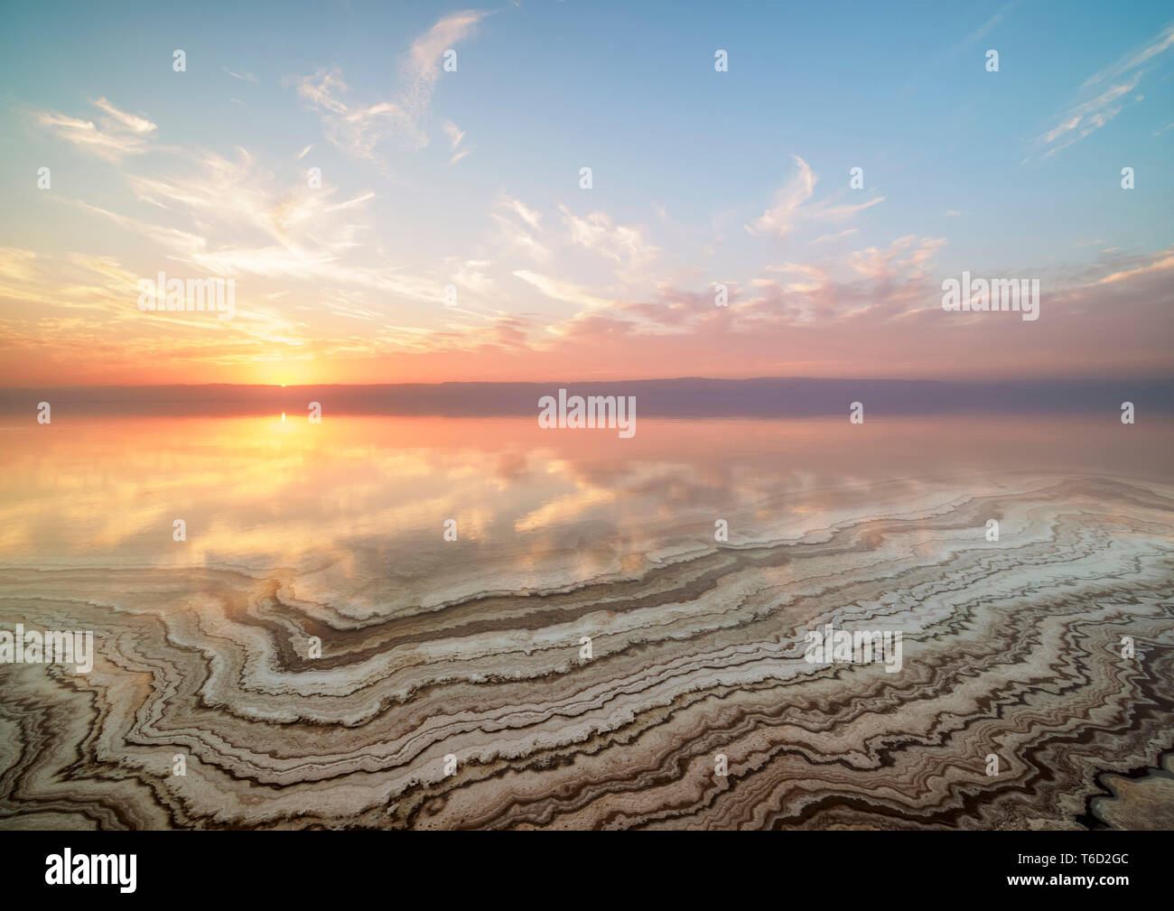 Salt Formations on the shore of the Dead Sea at sunset, Karak Governorate, Jordan Stock Photo