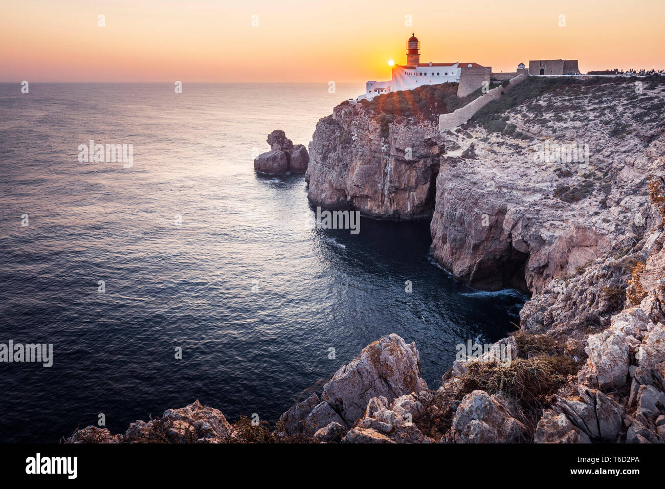 Portugal, Algarve, Vicentine Coast, Sagres, Cape St. Vincent (Cabo de Sao Vicente) at sunset Stock Photo