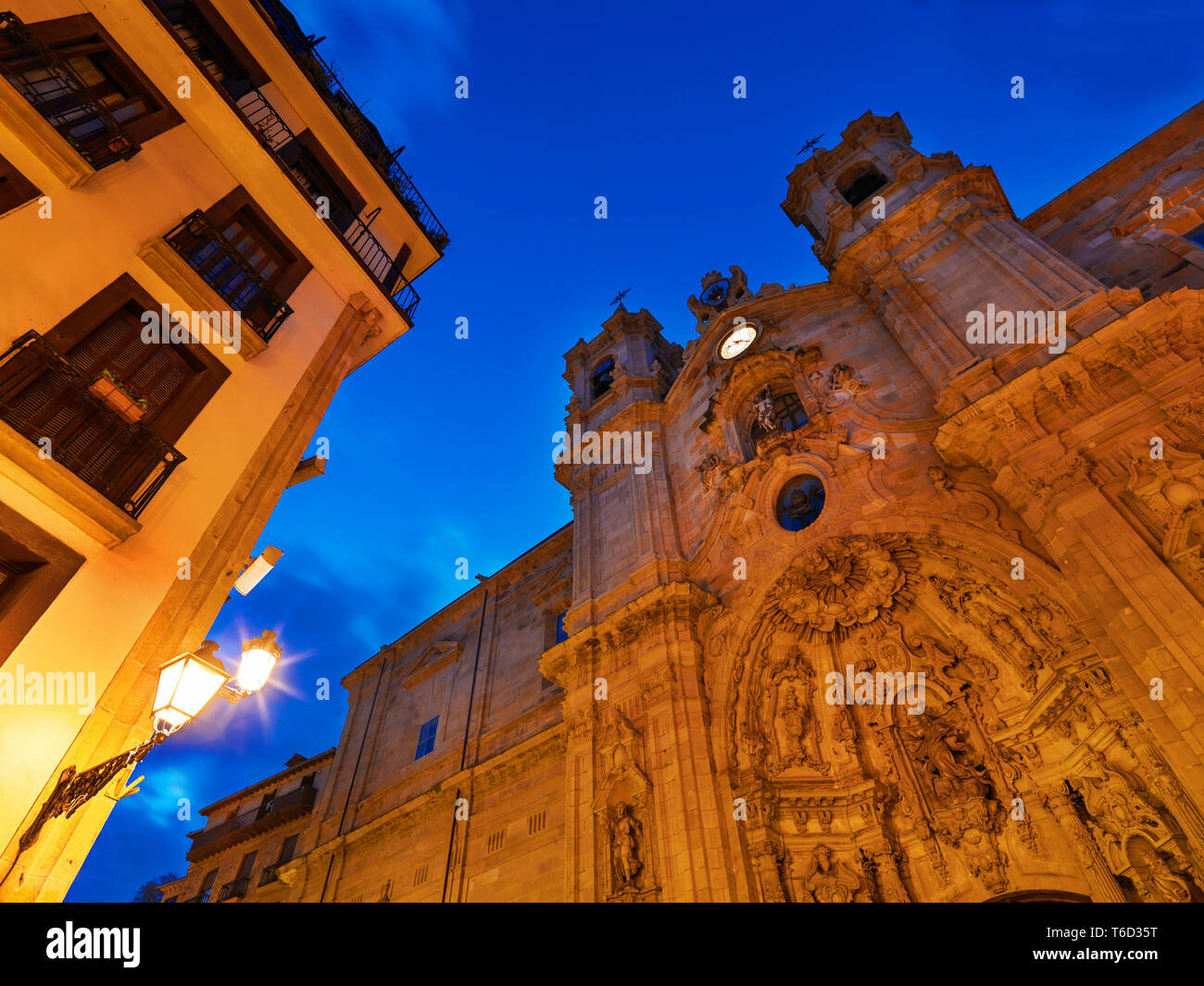 Spain, Basque Country, San Sebastian (Donostia). Santa Maria Church illuminated at night Stock Photo