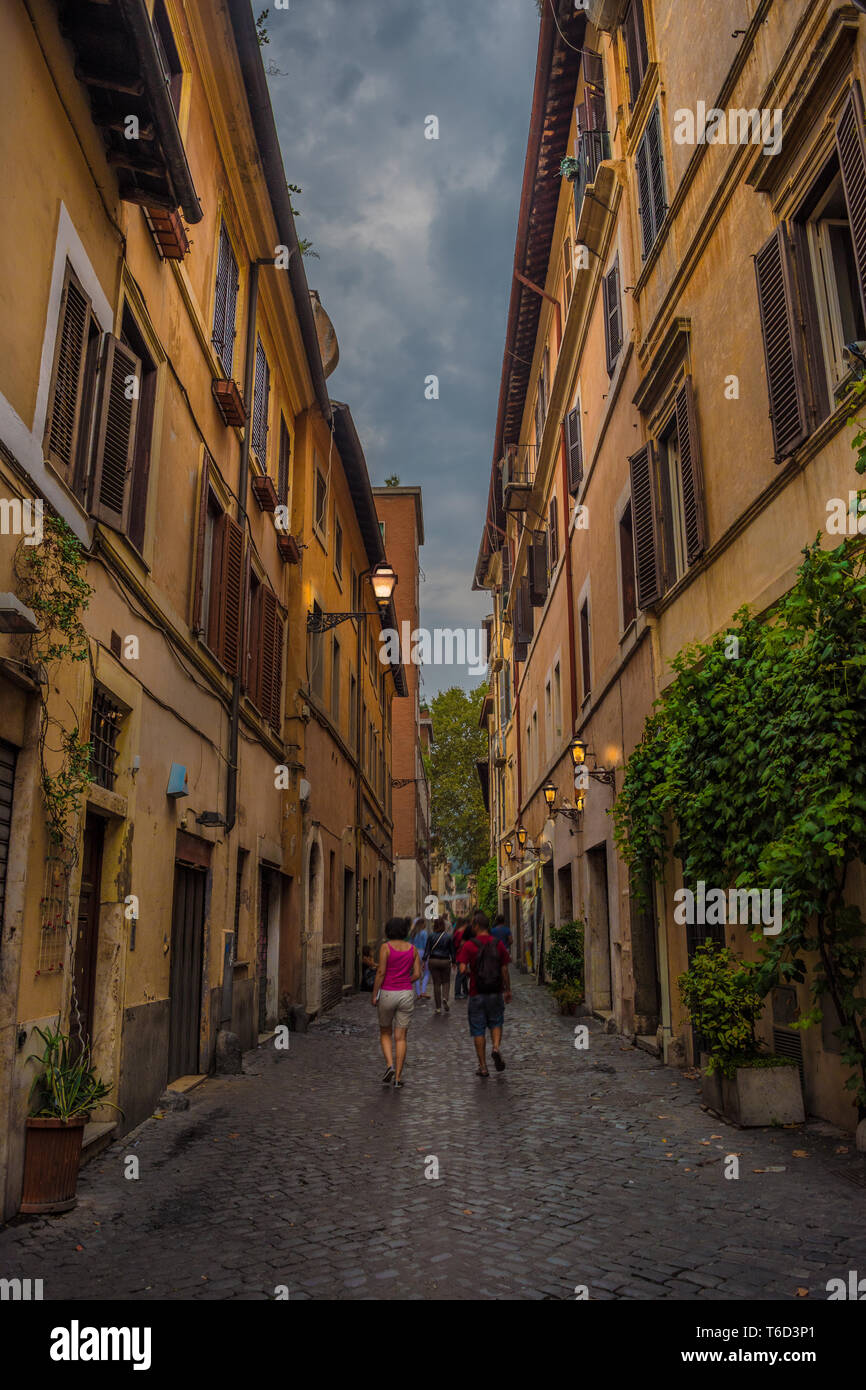 Walking through the narrow streets of Rome - Italy Stock Photo