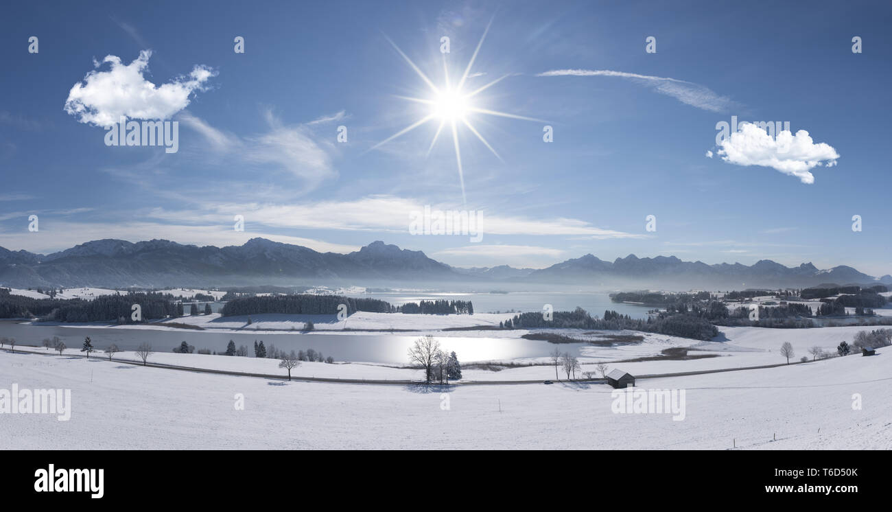 wide angle view to lake Forggensee in region Allgaeu in Bavaria, germany, at winter Stock Photo