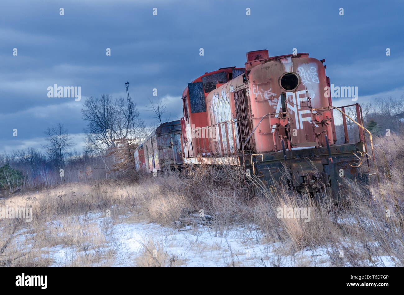 Abandoned locomotive with snow Stock Photo - Alamy